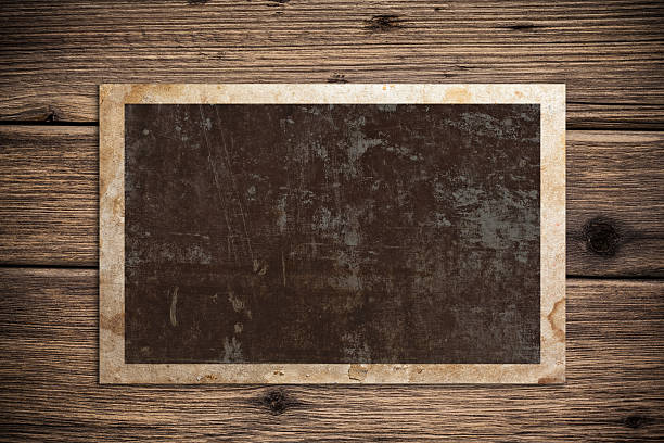 istock Old paper on the wood background 497284671