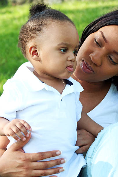 istock African American mom with child candid 497285847