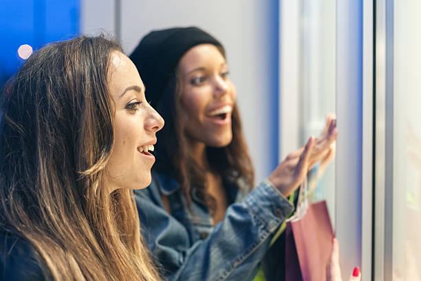 istock Two women friends doing shopping 497286108