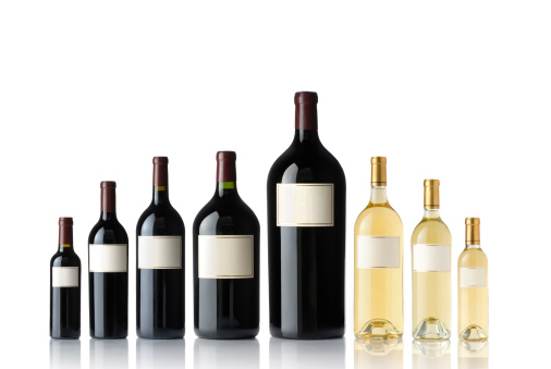 Red and white wine collection with blank labels. The bottle sizes are split, standard, magnum, double magnum and imperial.