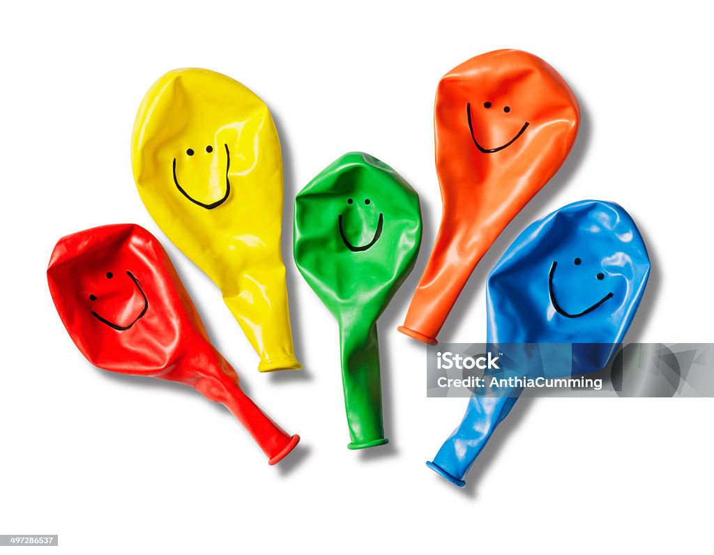 Ballons lumineux avec main dessinée heureux visages souriants - Photo de Ballon de baudruche libre de droits