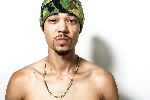 istock Black Shirtless Hip Hop Rapper Against White Background 497286941
