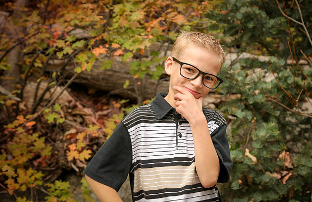 100+ Kid With Thick Glasses Stock Photos, Pictures & Royalty-Free