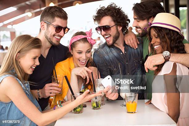 Friends Having Fun At The Bar Stock Photo - Download Image Now - 20-29 Years, Adult, Adults Only