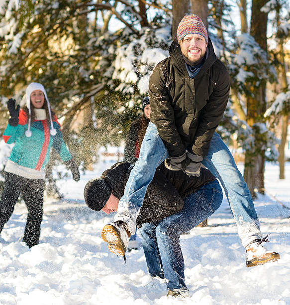 istock Jumping over another person in wintertime 497288790