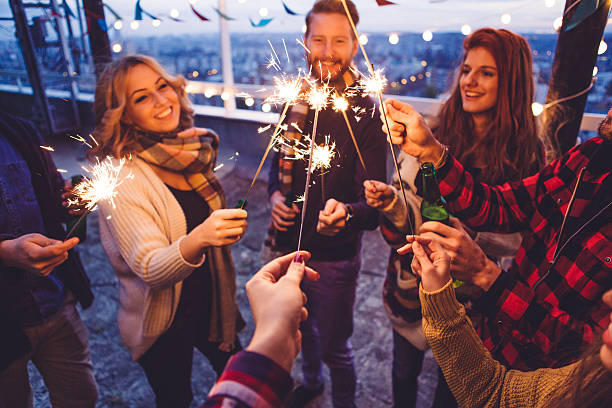 istock Group of friends at rooftop party 497288846