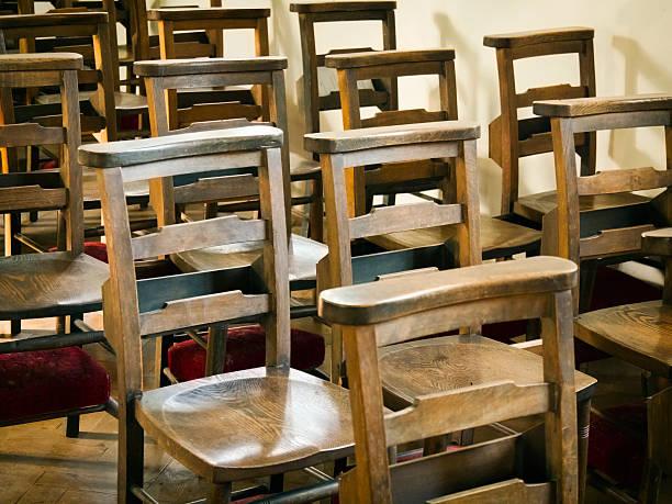 istock Rows of church chairs 497289430