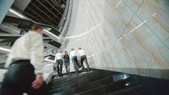 DS Business people walking up and down the stairs