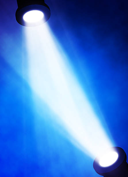 istock illustration of bright stage spotlight 497297479