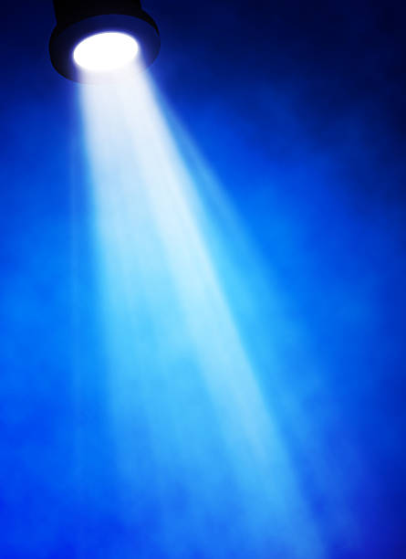 istock illustration of bright stage spotlight 497297485