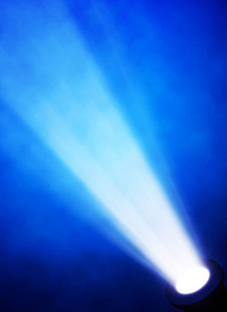 istock illustration of bright stage spotlight 497297487