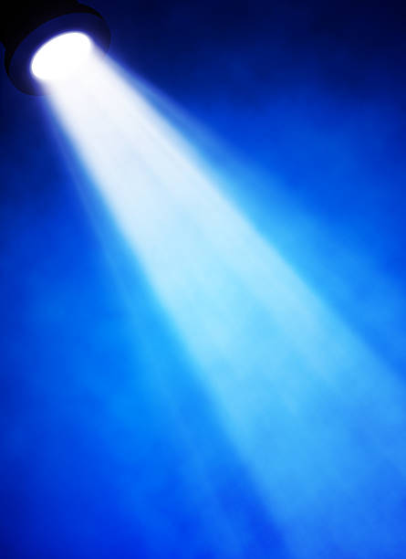 istock illustration of bright stage spotlight 497297491