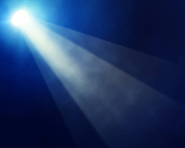 istock illustration of bright stage spotlight 497297499