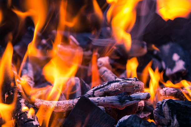 istock detail of fire on the grill 497297529