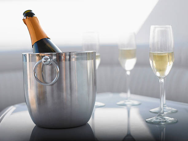 istock Flutes With Champagne Bottle In Ice Bucket 497299785
