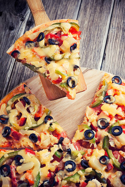 istock Delicious italian pizza served on wooden table 497299977