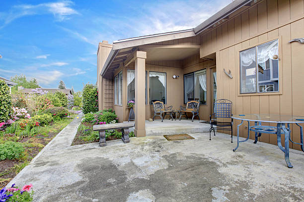 istock House exterior. Backyard porch and garden 497301041