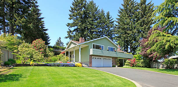 istock House with brick wall trim and garage 497301561
