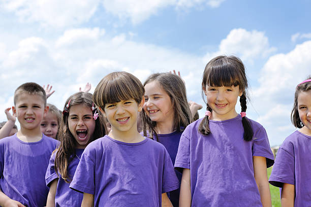 istock happy kids group  have fun in nature 497301967