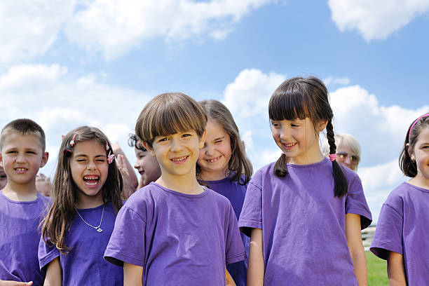istock happy kids group  have fun in nature 497301971