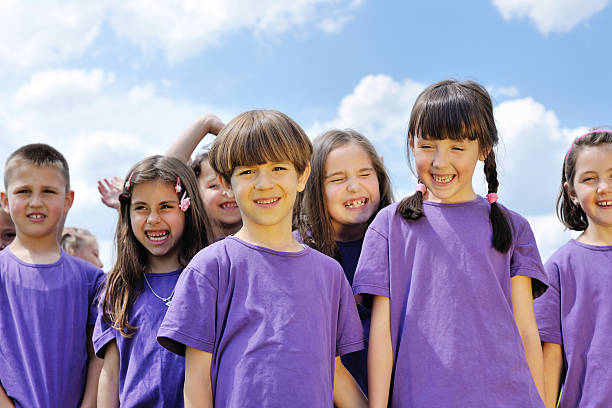 istock happy kids group  have fun in nature 497301973