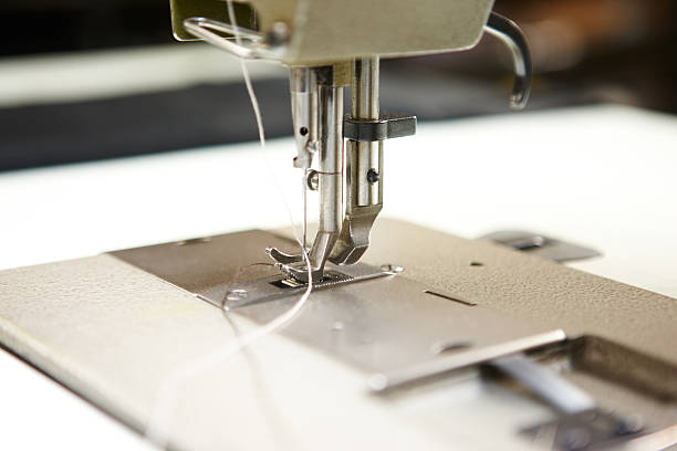 istock Sewing machine detail in warm tone 497303971