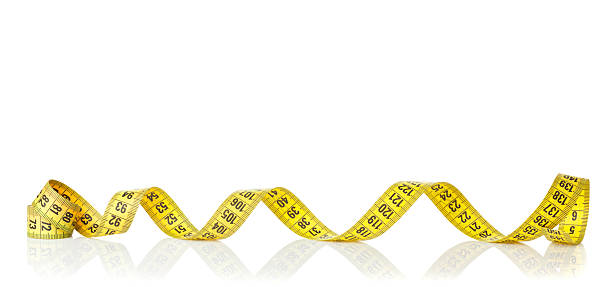 istock Yellow measure tape 497304661