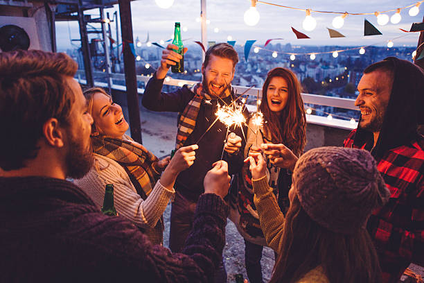 istock Group of friends at rooftop party 497308326