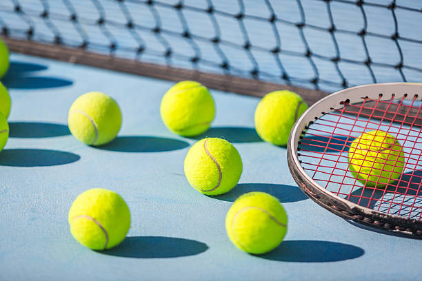 istock Tennis balls on Court 497309214