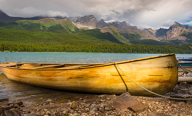 istock canoe on  the Maligne lake. Jasper National Park, Alberta, Canada 497310498