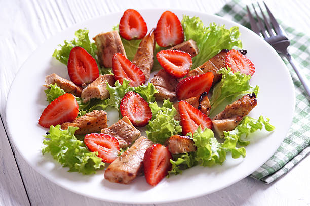 istock Chicken salad and strawberries 497310758