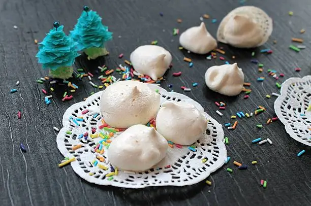 Photo of Meringue cakes in the New Year and Christmas decorations