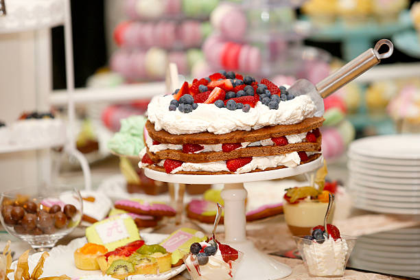 istock cake with strawberries and blueberries 497312046
