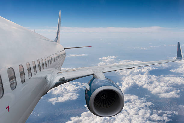 istock Body of an Airplane Flying Above Cloud 497312238