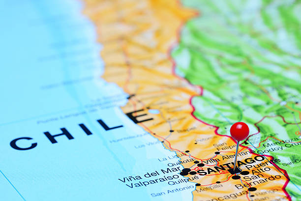 Santiago pinned on a map of Chile Photo of pinned Santiago on a map of Chile. May be used as illustration for traveling theme. chile map stock pictures, royalty-free photos & images