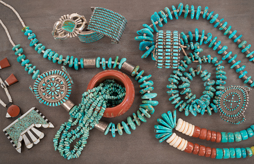 A collection of Vintage Native American Jewelry made of turquoise, silver, pipe stone and Heishe beads. A Santo Domingo “Depression Era” Necklace, and Turquoise 