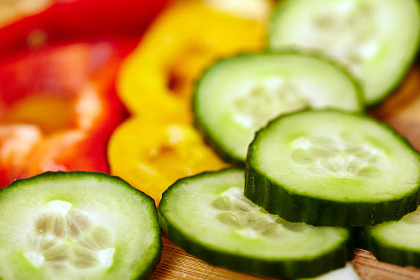 istock Fresh sliced vegetables on a wooden board 497314388