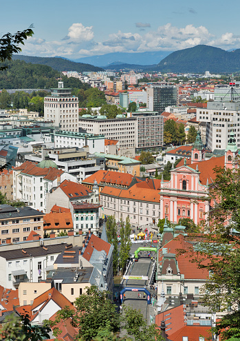 Ljubljana, Slovenia - September 6, 2015: Aerial view over old city center with Franciscan Church and Triple Bridge.