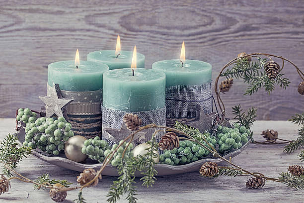 istock Four green christmas candle 497316560