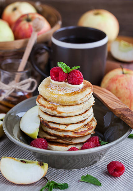 istock Apple pancakes with honey for breakfast 497316636