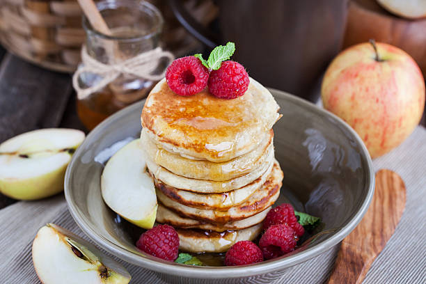 istock Apple pancakes with honey for breakfast 497316732