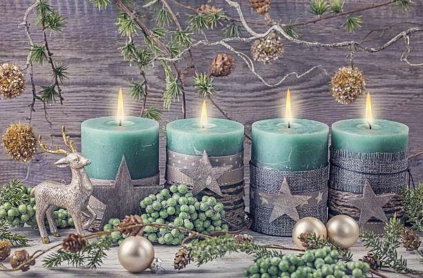 istock Four green christmas candle 497318046