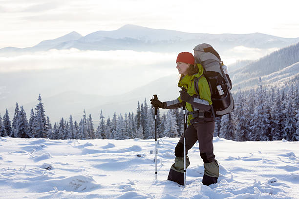istock Hiker walking in winter Carpathian mountains 497319280