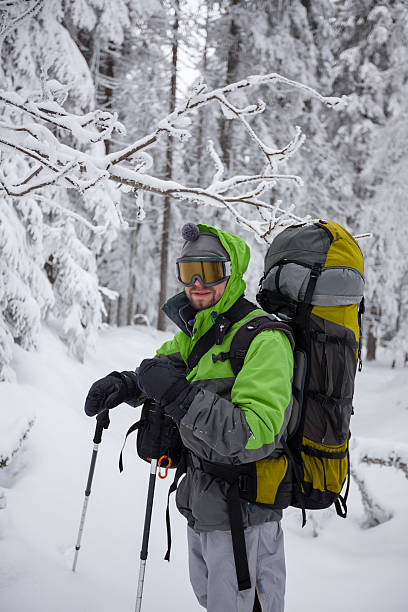 istock Hiker walking in winter Carpathian mountains 497319932
