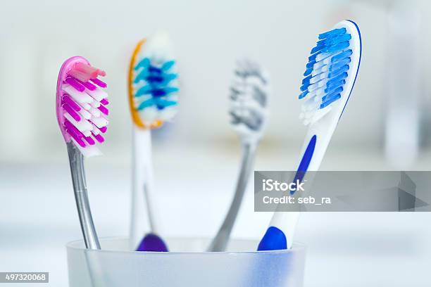 Tooth Brushes In Glass Stock Photo - Download Image Now - Toothbrush, Drinking Glass, No People
