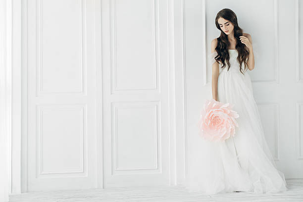 istock Studio shot of young beautiful bride 497320580