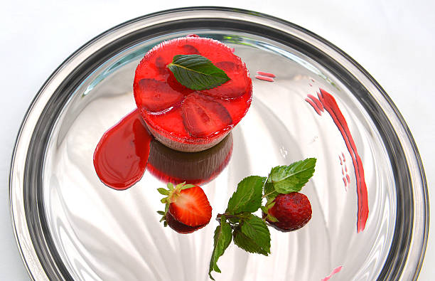 istock red jelly with whipped cream 497340667