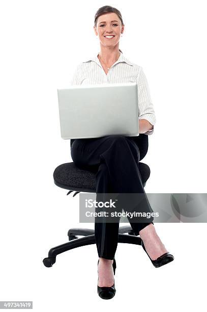 Corporate Lady Working On Her Laptop Stock Photo - Download Image Now - Adult, Beautiful People, Beauty