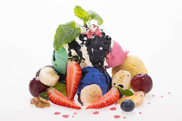 istock ice cream scoop with fresh fruits 497342645