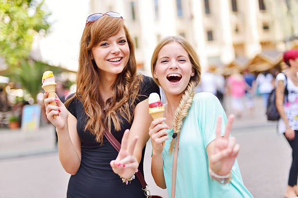 istock Young friends together eating icecream 497343283